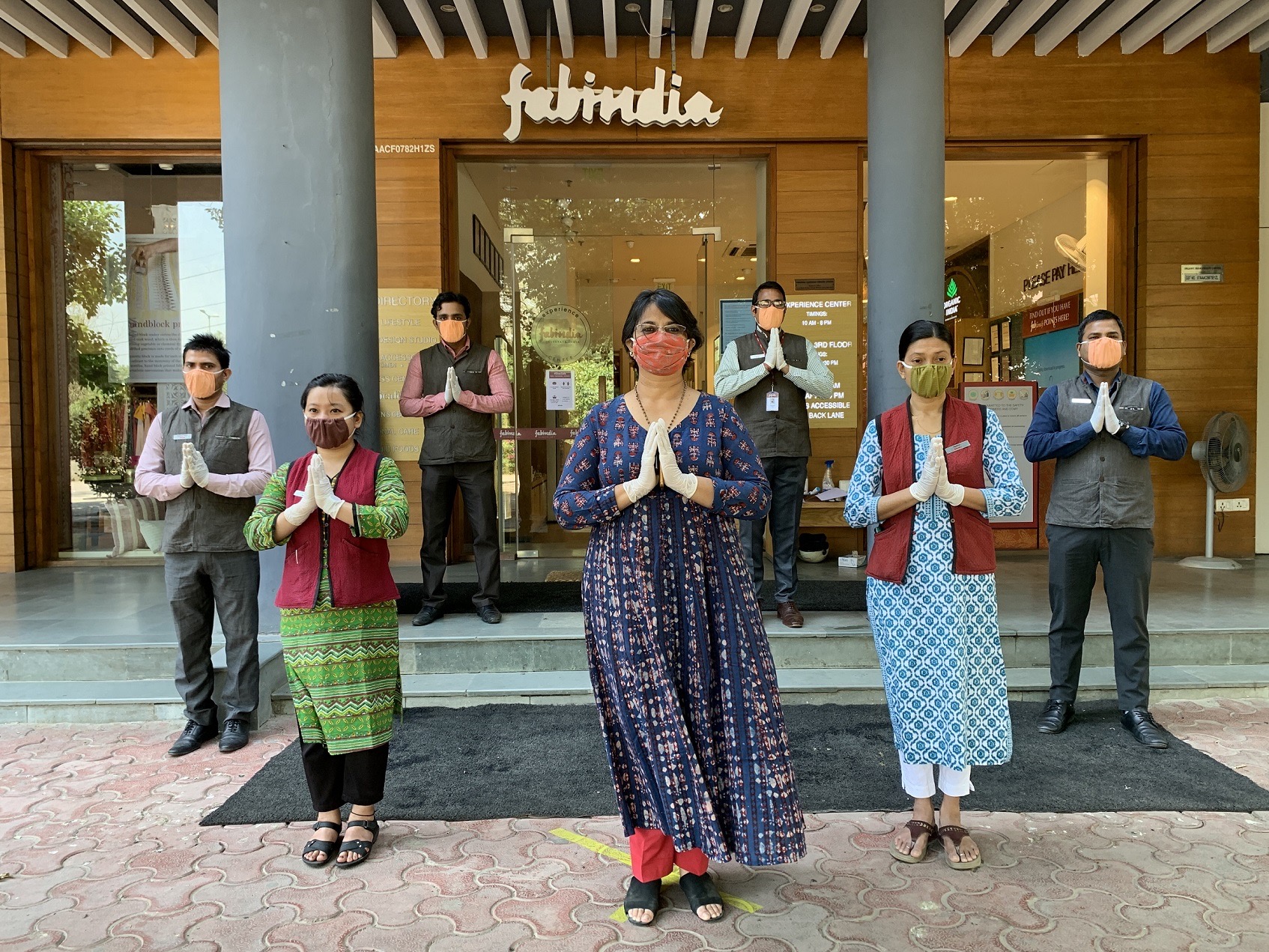 The Fabindia staff, ready to welcome customers back to store. (picture credit- Fabindia)