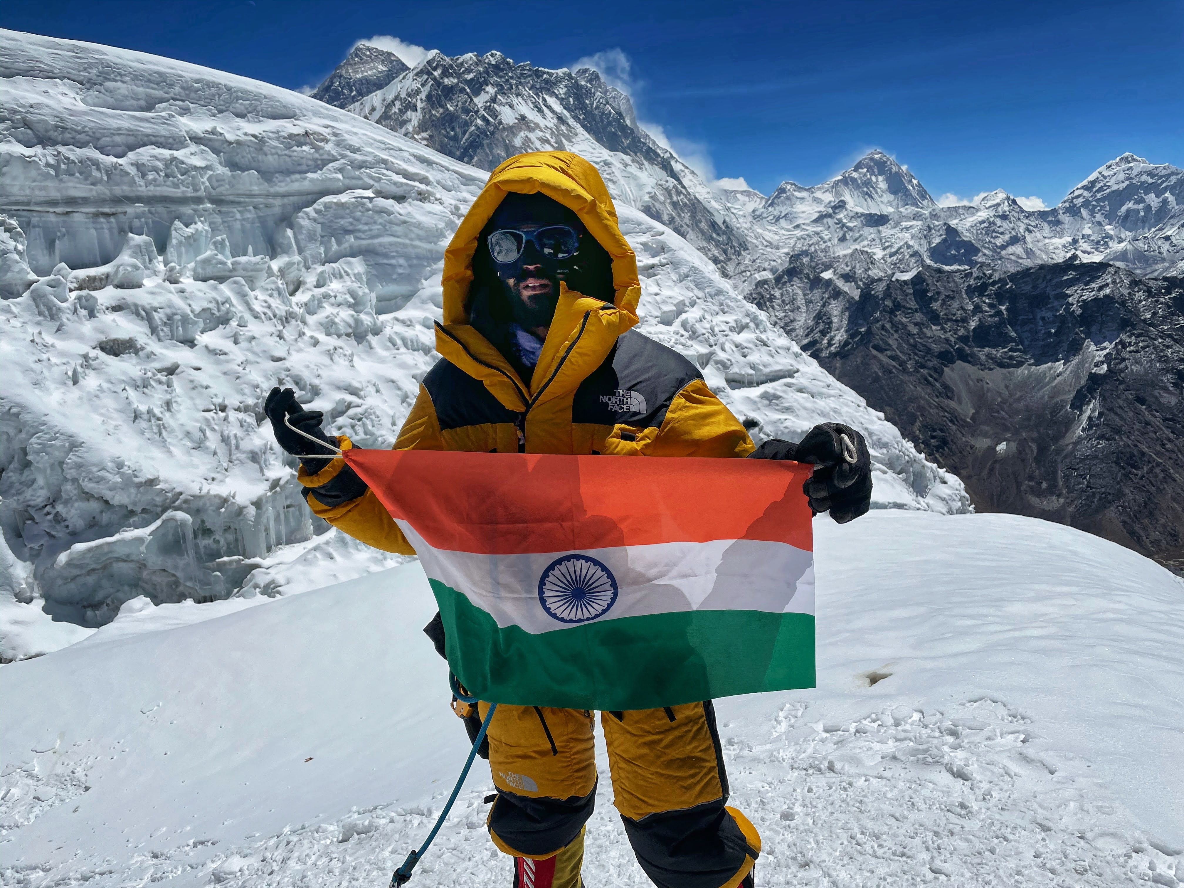 Harshvardhan Joshi with the Indian flag on Mt Everest (Source: Royal Stag)