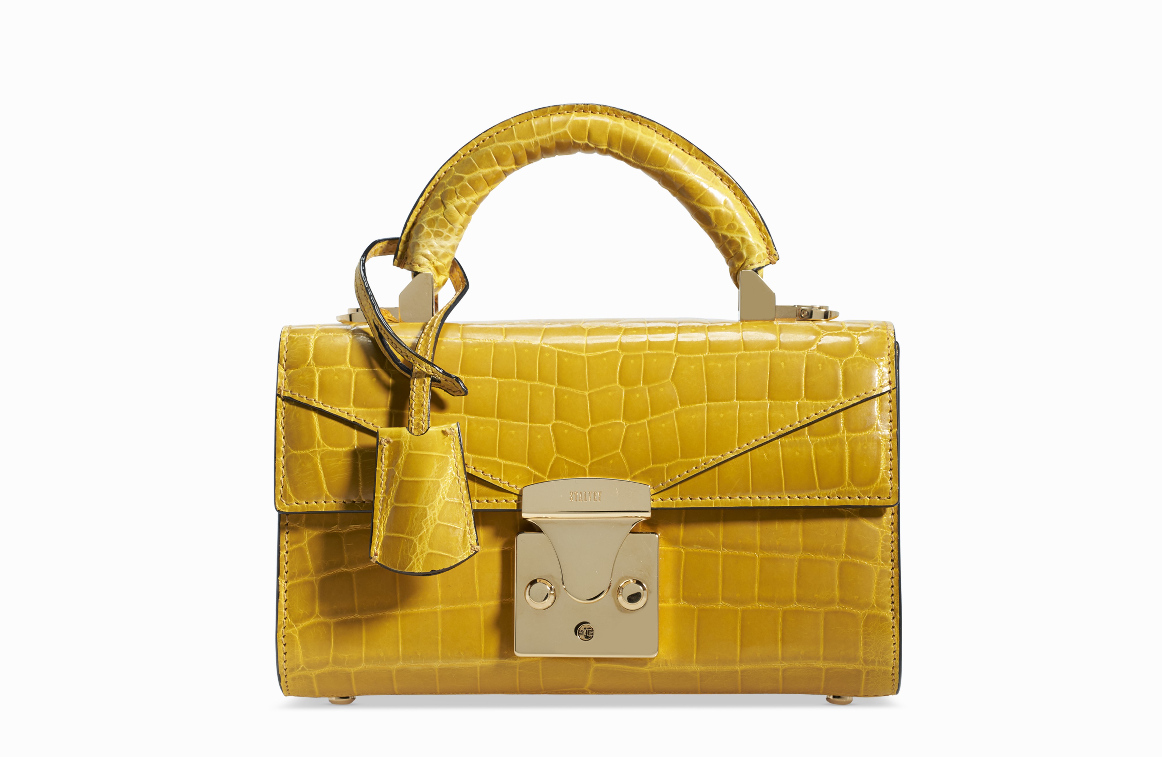 Stalvey, 2019 - A shiny yellow alligator top handle mini 2.0 with gold hardware price realized: $5,000