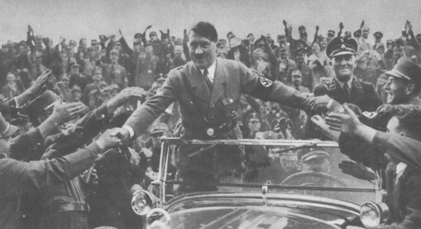 Adolf Hilter in a car, Source - hitler.org