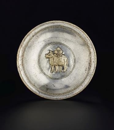 PROPERTY FROM AN IMPORTANT PRIVATE COLLECTION AN EXCEPTIONALLY RARE PARCEL-GILT SILVER 'RHINOCEROS' DISH TANG DYNASTY (AD 618-907) ESTIMATE: $1,000,000-1,500,000