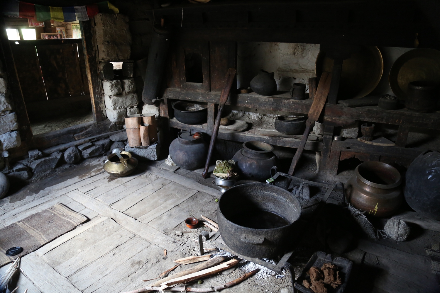 A 500 year old kitchen with traditional stone and copper vessels in Garkon, Kargil as shown in LF's Himalayas- The Offbeat Adventure