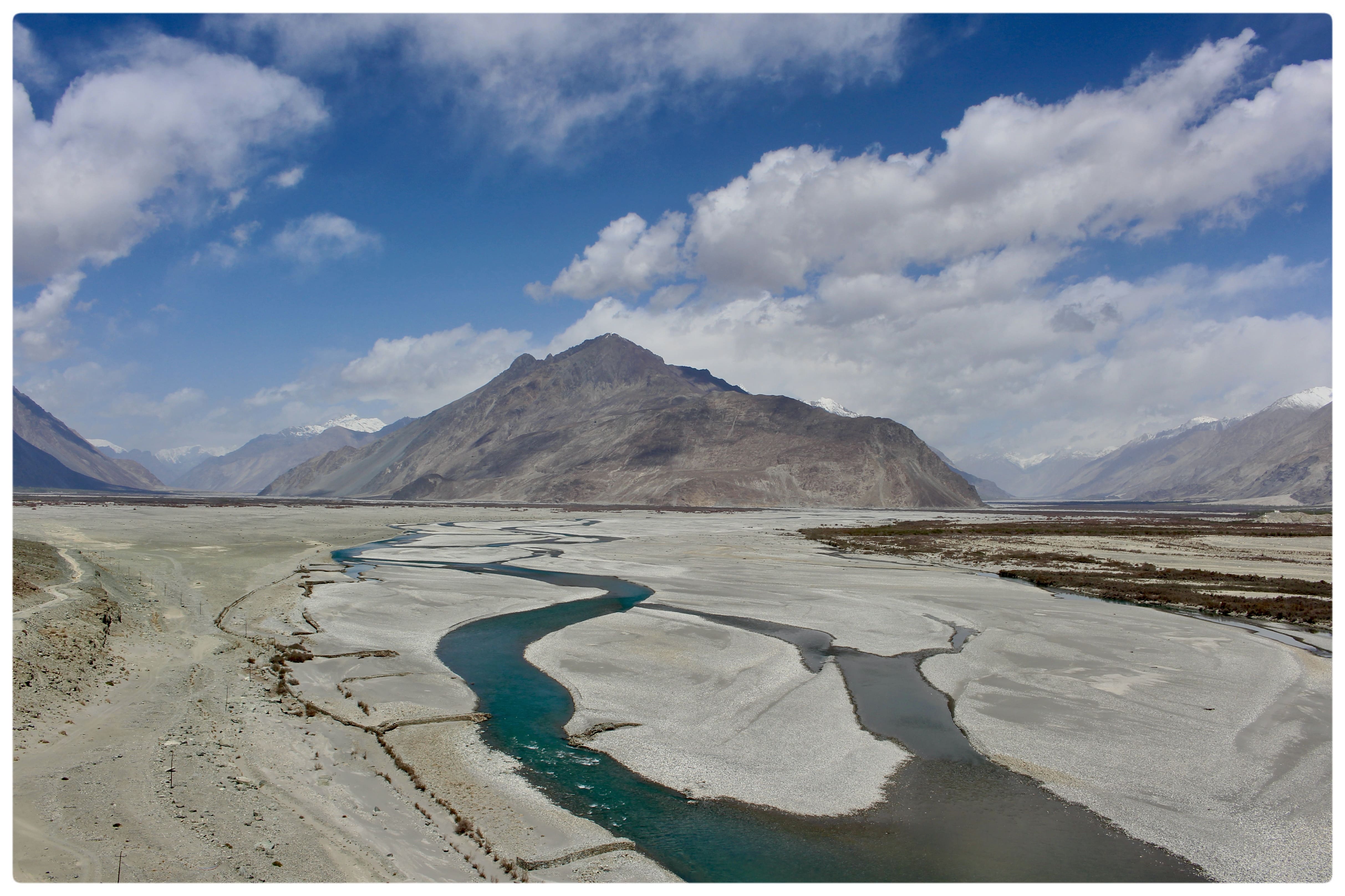  A Shyok river originating at the Rimo glacier spreads across the wide riverbed in Nubra Ladakh (Source - Artist)