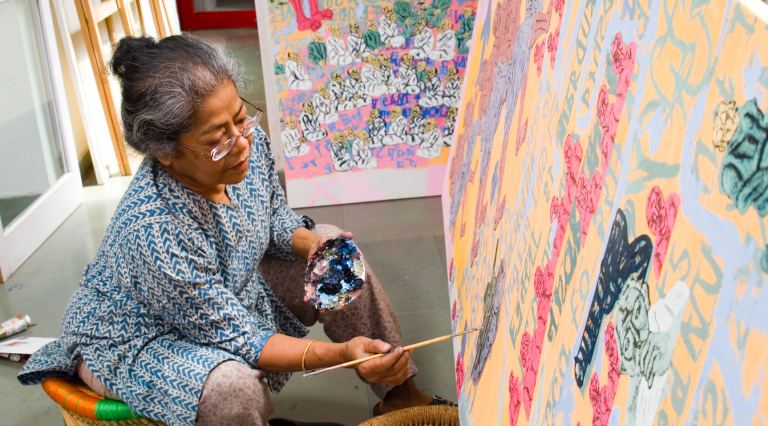 Arpita Singh in her studio, photo courtesy of Vadehra Art Gallery