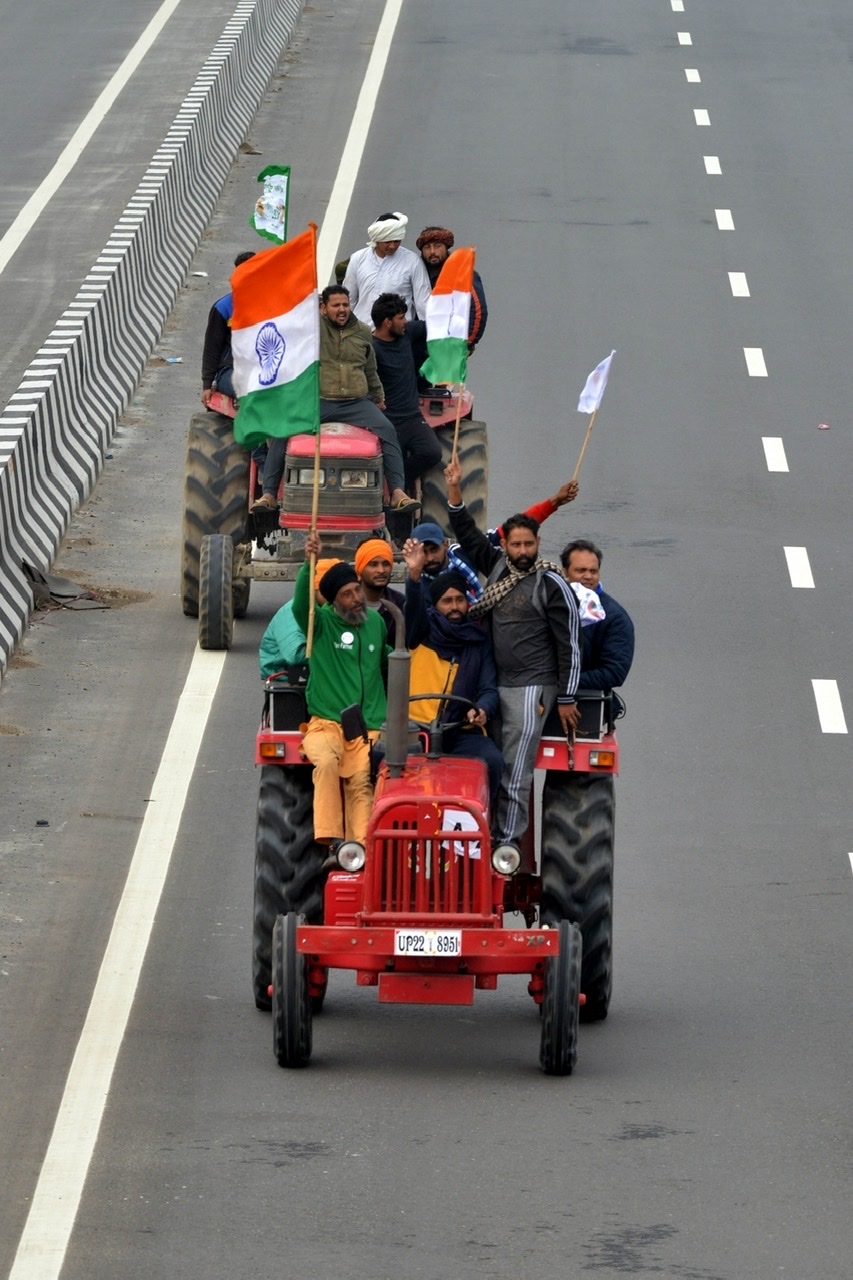 A day ahead of the next round of talks with the Union government, thousands of farmers organised a 'tractor march', describing the event as a "rehearsal" for a similar roadshow proposed on January 26 to oppose the three new central farm laws; at Ghazipur Border on Jan 7, 2021. (Photo: Bidesh Manna/IANS)
