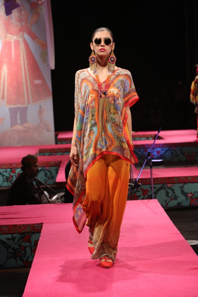 A model showcases fashion designer Tarun Tahiliani's creation