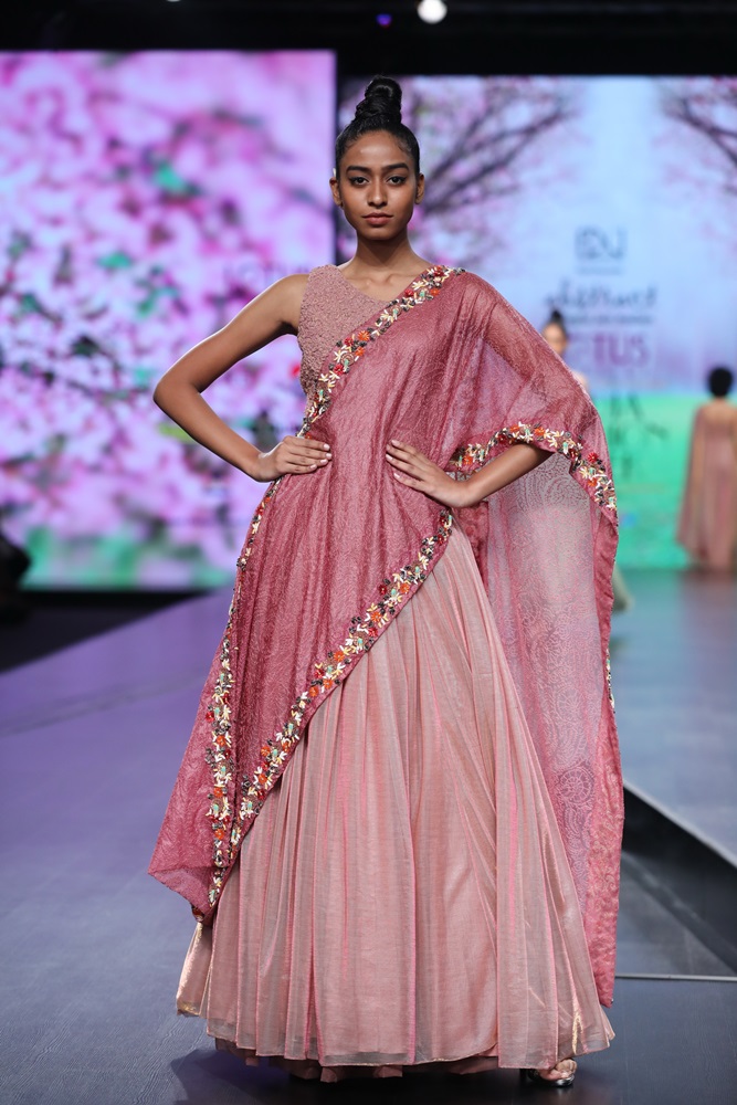 A model showcases the collection from fashion designer Megha Jain Madaan's fashion label 'Abstract' on the second day of Lotus Make-up India Fashion Week, in New Delhi on Oct 10, 2019. (Photo: IANS)
