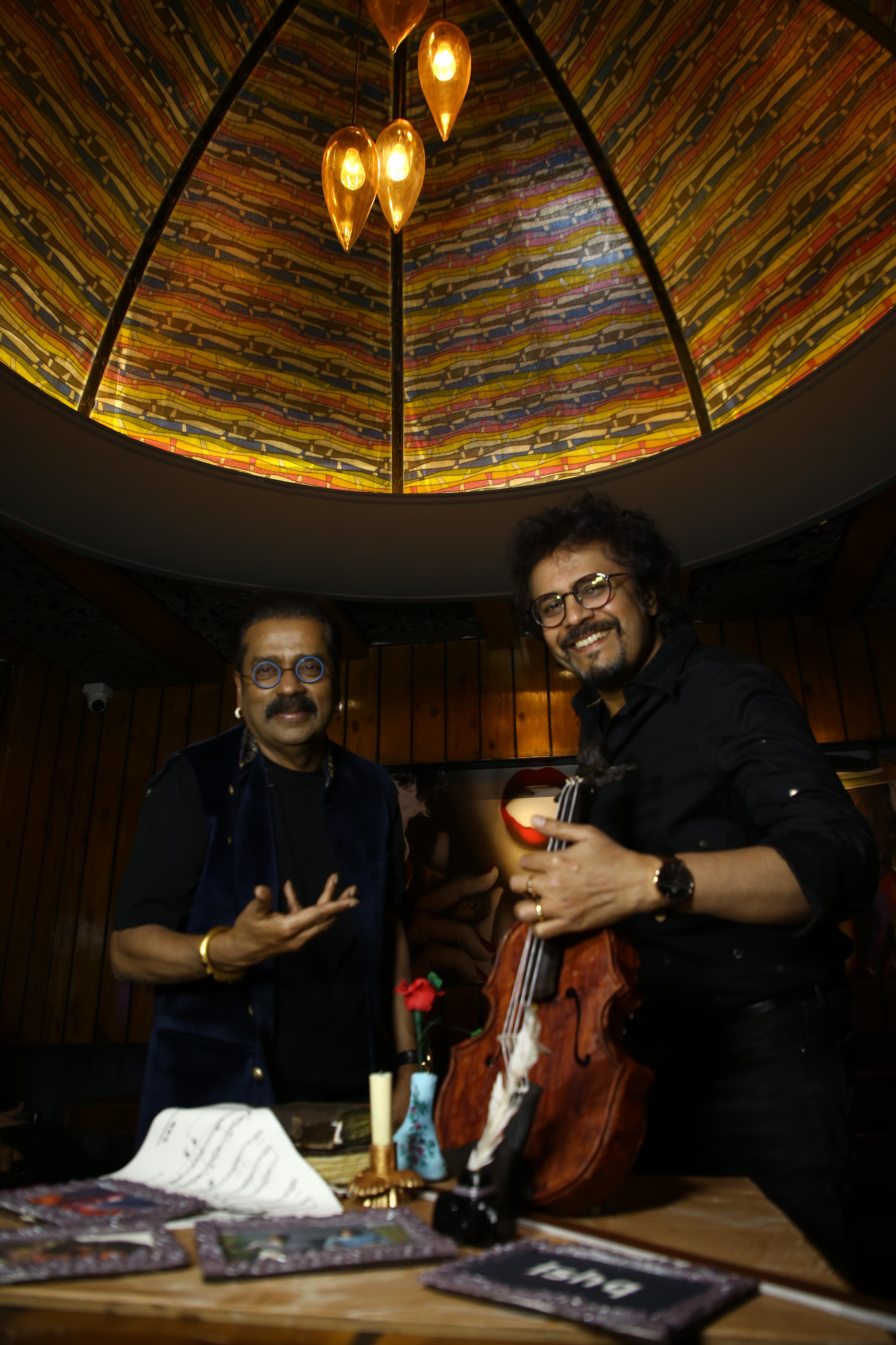 Hariharan and Bickram Ghosh play with chocolate violin made by Chef Harneet Jolly at the launch of their EP, Ishq – Songs Of Love