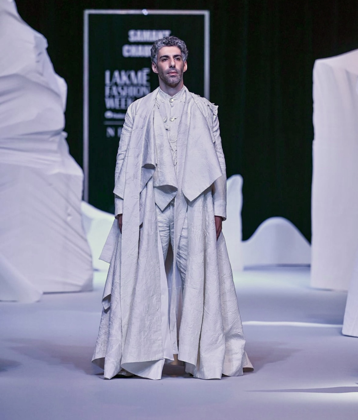 Actor Jim Sarbh in an all-white layered ensemble from Samant Chauhan