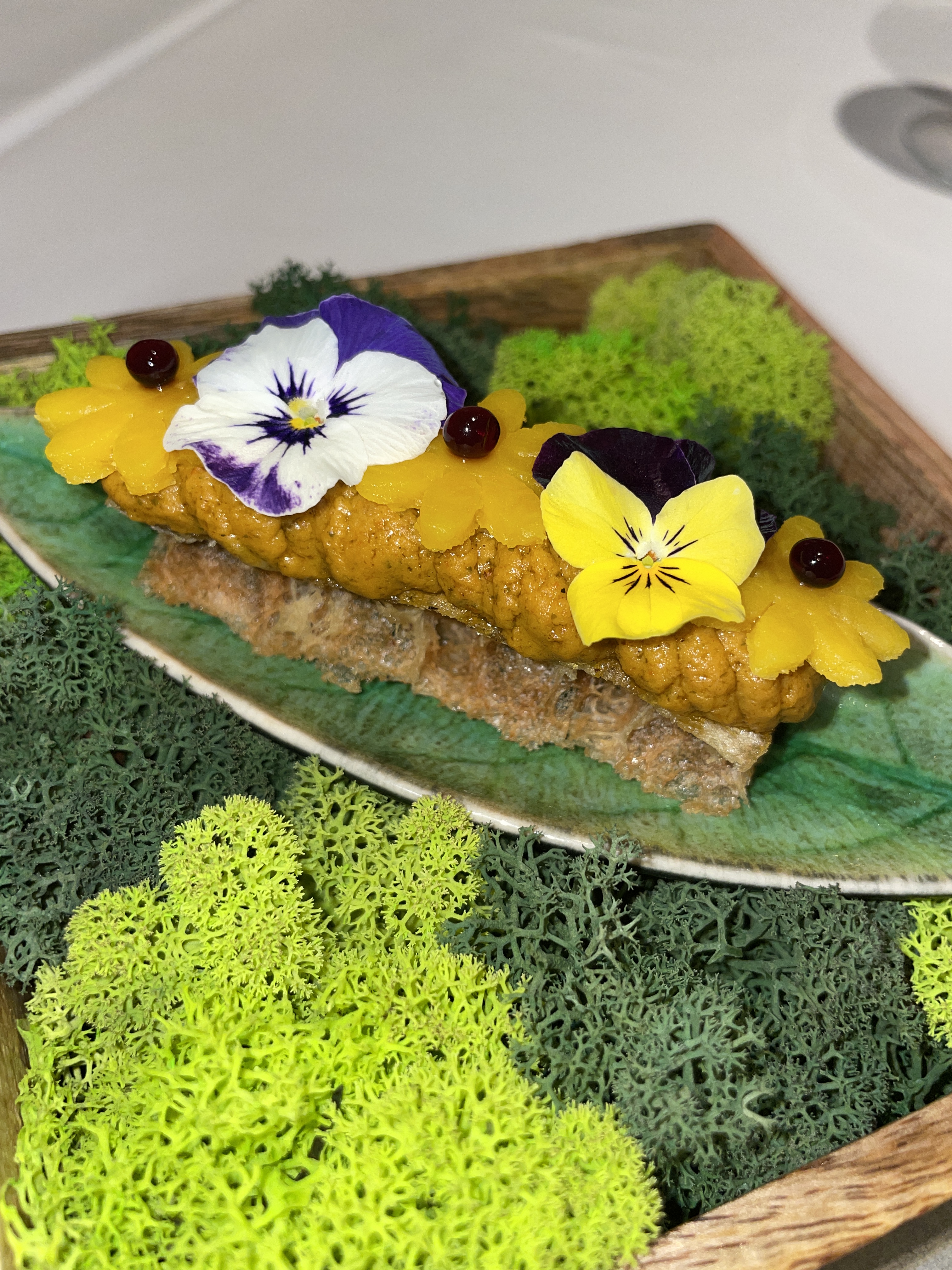 Lauki Bharta (bottle guard), accompanied by crispy Papadum Waffle and tangy Pickled Pumpkin at Avatara.