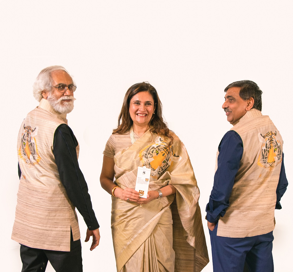 Upendra Prasad Singh, Secretary, Ministry of Textiles, Government of India with Mr Sunil Sethi, Chairman, FDCI and Sagrika Rai (the creator of the collection)