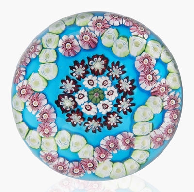 A Clichy patterned millefiori colour-ground weight