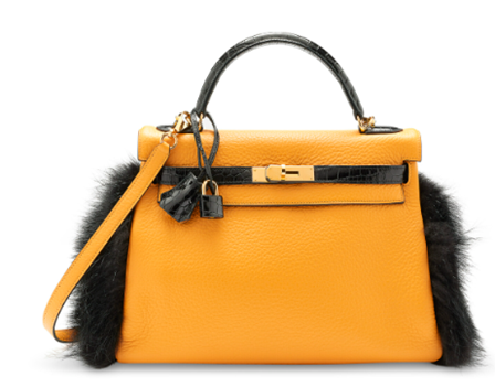 A rare, Petit H Jaune d’Or Clémence leather, shiny black crocodile and black fox-fur Kelly 28 with gold hardware, Hermès, 2015. Estimate: €15,000-20,000. Offered in Inside the Orange Box: Part III, 13-28 June 2023 at Christie’s Online