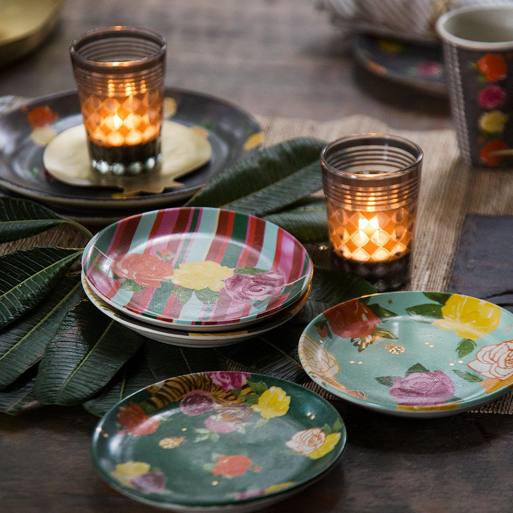 Dinnerware is inspired by the bold illustrations that feature on the caravans of the Romani traveling tribes