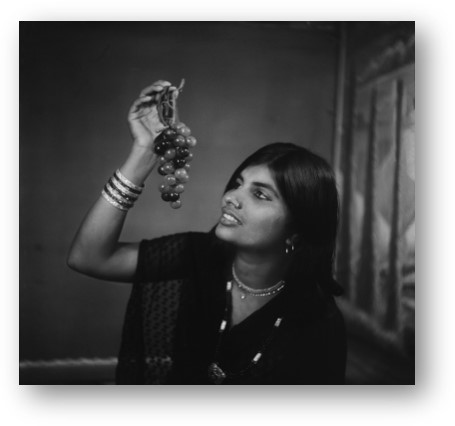 Untitled (Portrait of a Woman with a Bunch of Grapes), Suhag Studio, Nagda, Madhya Pradesh by Suresh Punjabi, Suhag Studio, c. 1981, Celluloid negative, Nagda, Madhya Pradesh, India, PHY.12229   