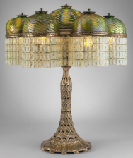 TIFFANY STUDIOS IMPORTANT AND RARE 'ARCH AND LEAF' TABLE LAMP, CIRCA 1905   Favrile glass, silvered bronze 32 in. high, 27 in. diameter  $150,000-200,000