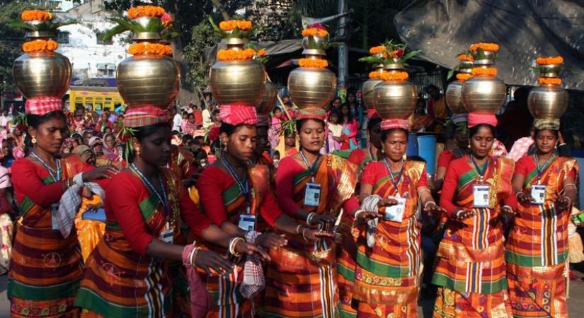 Tribal artistes perform during 'Ulgulan' anniversary observance meeting in Kolkat