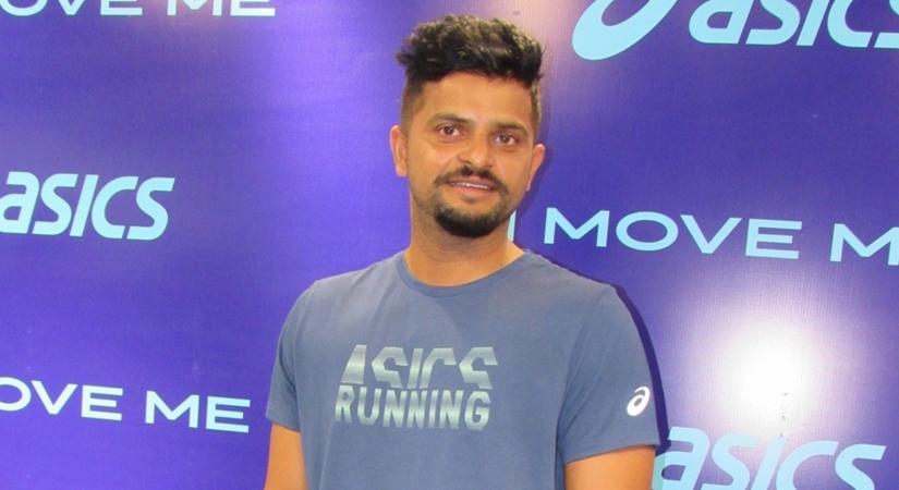 Indian cricketer Suresh Raina at the launch of a footwear range of ASICS. (Photo: IANS)
