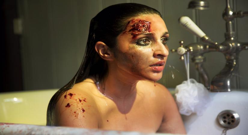 Actress Parineeti Chopra gave a sneak peek of her "intense" look from her upcoming film the Hindi remake of Hollywood thriller "The Girl On The Train".Parineeti on Wednesday took to Twitter to share her first look, which she described as "most difficult". In the new still, she appears heavily bruised, sitting in a bath tub with an expressions of shock on her face.
