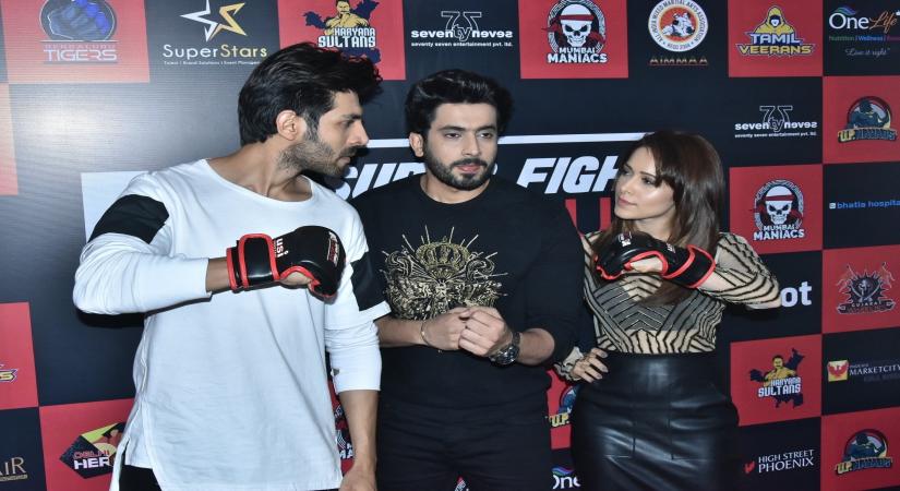 Mumbai: Actors Kartik Aaryan, Sunny Singh and Nushrat Bharucha at the Super Fight League in Mumbai on Feb 23, 2018. (Photo: IANS)