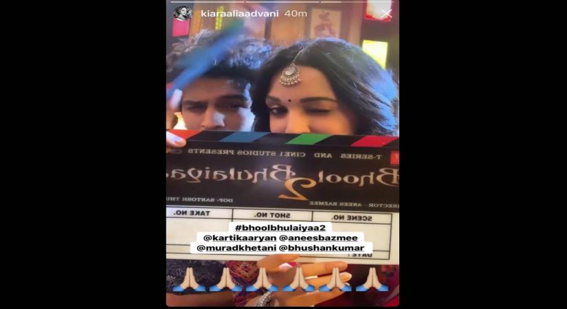 Shooting for the second instalment of "Bhool Bhulaiyaa" directed by Anees Bazmee has begun. Actress Kiara Advani took to her Instagram Stories, where she shared a boomerang video of herself along with actor Kartik Aaryan and the film's clapboard. (Photo Courtesy: Instagram)