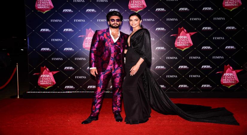 Actor Ranveer Singh with his wife actress Deepika Padukone. (Photo: IANS)