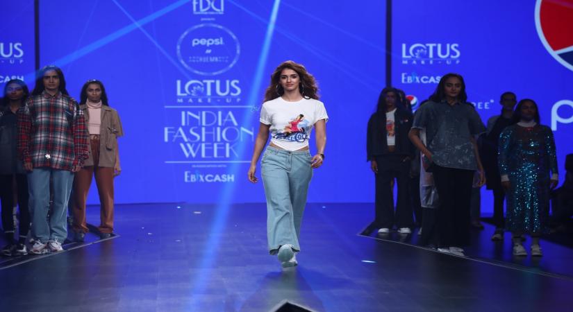 New Delhi: Actress Disha Patani walks the ramp showcasing collection from Pepsi's ready-to-wear label HUEMN on the first day of Lotus Make-up India Fashion Week, in New Delhi on Oct 9, 2019. Pepsi marked its foray into the fashion industry through a collaboration with label HUEMN, that was launched at FDCI's Lotus India Fashion Week SS20. The collection, created by designer duo Pranav Misra and Shyma Shetty, comprises statement athleisure. All denim fabric used in the collection is made using re