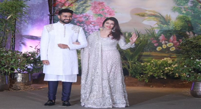 Mumbai: Actor Abhishek Bachchan along with his wife Aishwarya Rai Bachchan at the wedding reception of actress Sonam Kapoor and businessman Anand Ahuja in Mumbai on May 8, 2018. (Photo: IANS)
