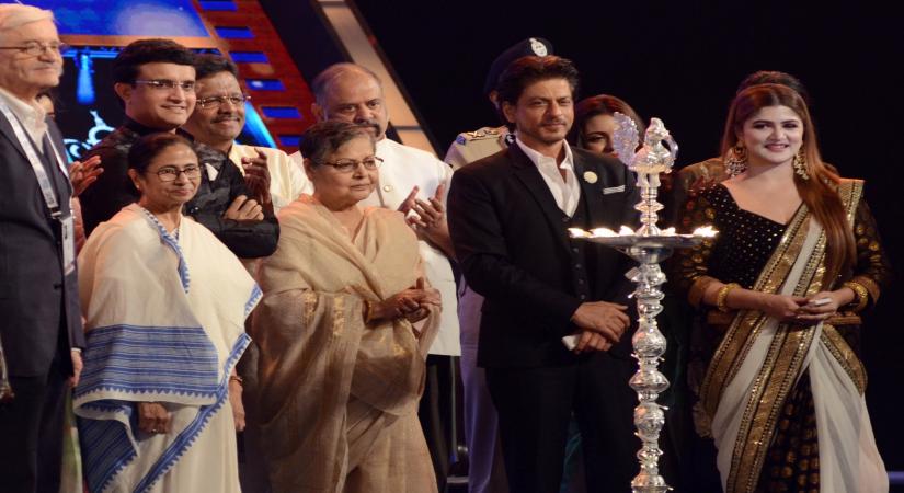 Kolkata: West Bengal Chief Minister Mamata Banerjee, Cabinet Minister Firhad Hakim, BCCI President Sourav Ganguly and actors Shah Rukh Khan and Rakhee Gulzar light the lamp to inaugurate 25th Kolkata International Film festival, in Kolkata on Nov 8, 2019. (Photo: Kuntal Chakrabarty/IANS)