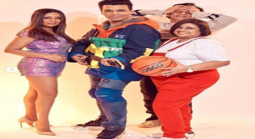 Filmmaker Karan Johar channeled his inner Rahul from  "Kuch Kuch Hota Hai" and superstar Shah Rukh Khan's wife Gauri dressed up as Tina from the film for a 90's Bollywood theme party. Karan on Tuesday night shared a string of photographs of their look from the party. One picture even had an "embarrassed" Shah Rukh photobombing as Karana and Gauri posed for the camera.