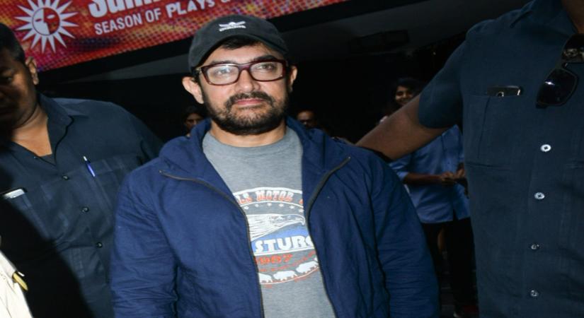 Mumbai: Actor Aamir Khan seen outside a theatre, in Mumbai's Juhu, on May 23, 2019. (Photo: IANS)