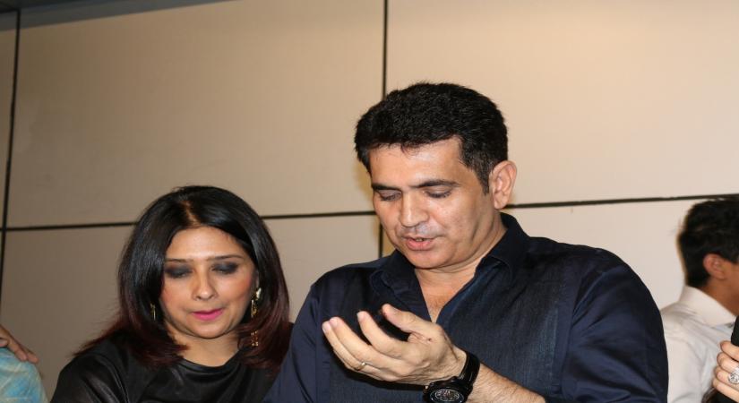 Mumbai: Filmmaker Omung Kumar and his wife Vanita Omung Kumar during filmmaker Omung Kumar birthday party in Mumbai on Oct. 9, 2016. (Photo: IANS)