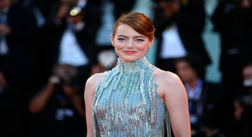 VENICE, Aug. 31, 2016 (Xinhua) -- Actress Emma Stone arrives at the red carpet to attend the opening ceremony of the 73rd Venice Film Festival in Venice, Italy, Aug. 31, 2016. (Xinhua/Jin Yu/IANS)