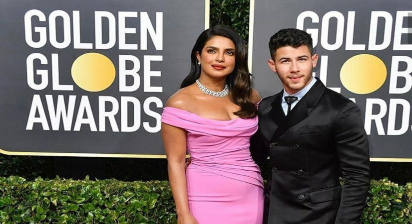 Priyanka Chopra Jonas and her hubby Nick Jonas made a stylish appearance at the red carpet of the 77th Golden Globe Awards ceremony.Dressed in a pink off-shoulder ensemble, Priyanka looked no less than any diva and it was her diamond neckpiece which grabbed the maximum attention. On the other hand, Nick look dapper in a black suit.