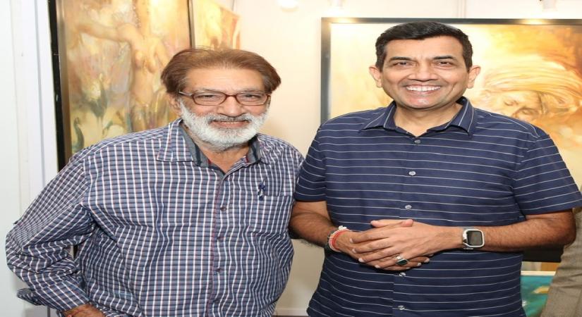 Artist Prithvi Soni with chef Sanjeev Kapoor at the India Art Festival 2020.