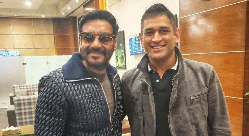 Bollywood actor Ajay Devgn met Former India captain M.S. Dhoni and said that cricket and films are the uniting religion of India. Ajay on Thursday morning shared a photograph of himself on Twitter posing with Dhoni.