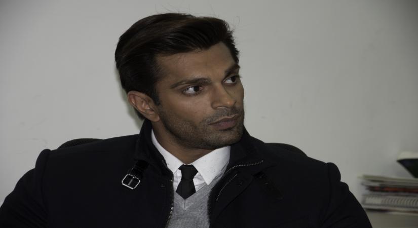New Delhi: Actor Karan Singh Grover during his visit to IANS office in New Delhi, on Dec 2, 2015. (Photo: Sandeep Datta/IANS)