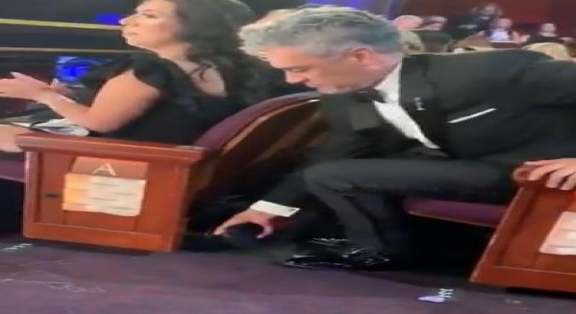 Video of Taika Waititi hiding his Oscar trophy under a seat goes viral.