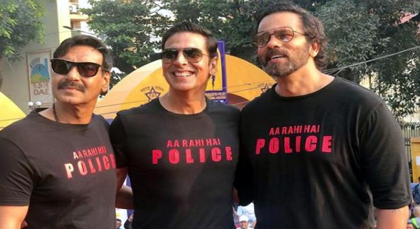 It turned out to be a reunion of sorts for the Bollywood policemen "Singham" and "Sooryavanshi" on Sunday as Ajay Devgn and Akshay Kumar attended the Maharashtra Police International Marathon. They were accompanied by filmmaker Rohit Shetty, who has earlier helmed Ajay-starrer "Singham", and is all set to come up with another cop drama "Sooryavanshi", featuring Akshay.