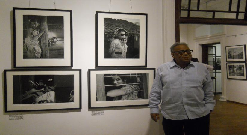 Photographer Nemai Ghosh exhibiting his work "Satyajit Ray and
Beyond" presented by the Delhi Art Gallery in Kolkata on August 16, 2013.
Nemai Ghosh is best known as Satyajit Ray's photographer. (Photo::: IANS)
