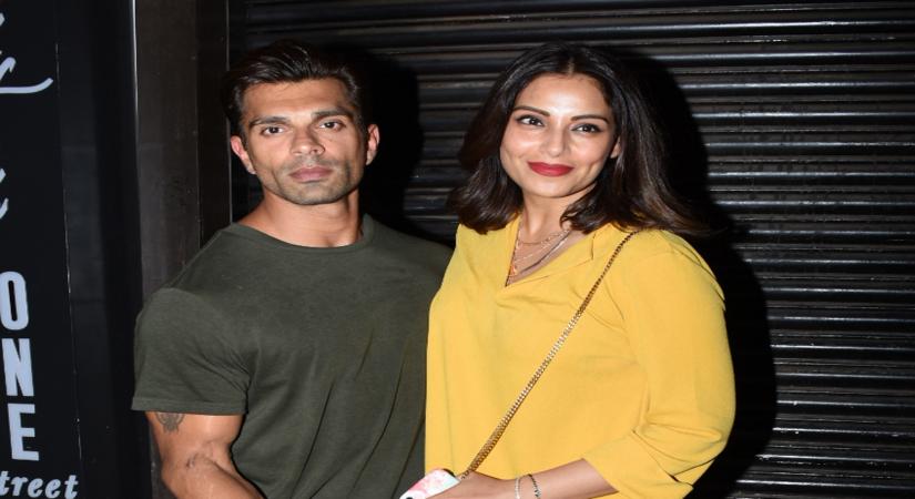 Actress Bipasha Basu donned the chef's hat and tried making hubby Karan Singh Grover's favourite besan laddoos to mark their upcoming fourth wedding anniverary. The recipe came from dancing diva Malaika Arora and chef Chinu. (Photo: IANS)
