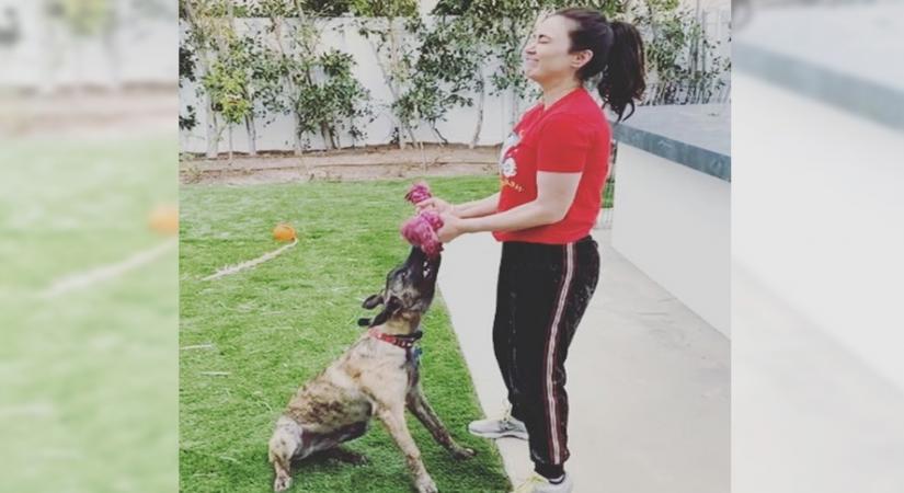Preity Zinta workout with pet dog.