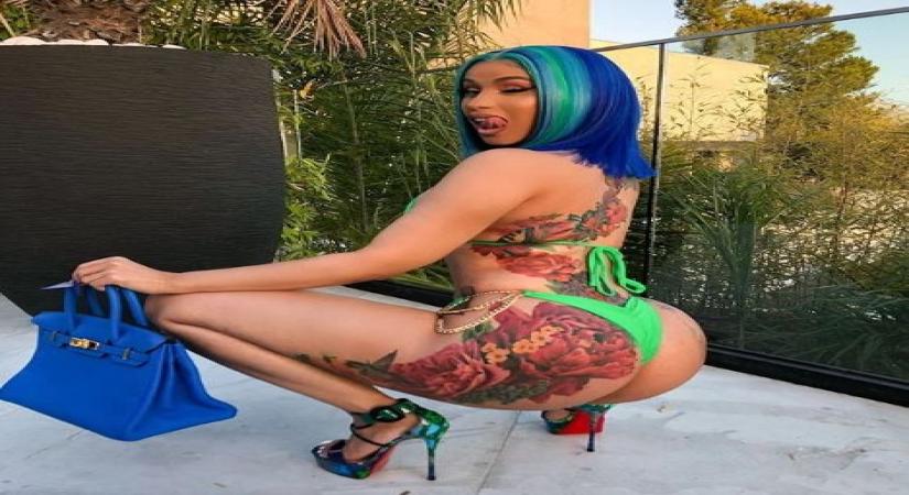 Cardi B Shows Off Curves and Back Tattoo in Body-Hugging Dress