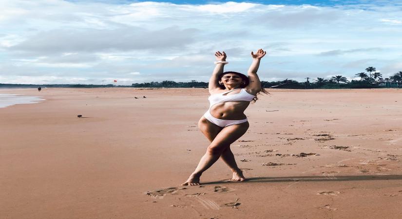 Alaya F celebrates 'freedom' in a white cut-out monokini.