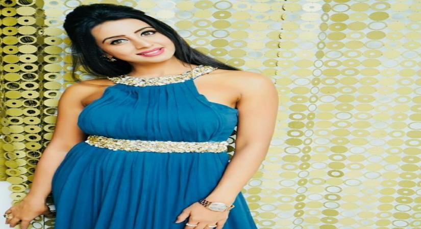 Police raid Kannada actress Sanjana Gulrani's home in drug case.