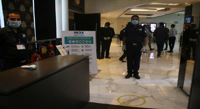New Delhi: Precautions against COVID-19 in place at the INOX cinema hall in New Delhi on Oct 13, 2020. Cinema halls in the national capital shall reopen from October 15 amid the Covid-19 pandemic as part of Unlock 5.0. (Photo: IANS)