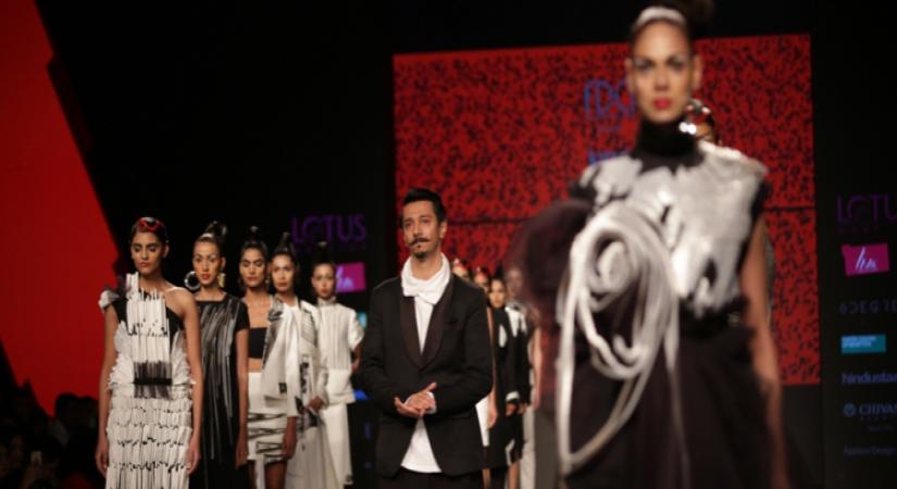 A model walks the ramp showcasing the creations of fashion designer Nitin Bal Chauhan on the second day of Lotus India Fashion Week in New Delhi. (Photo: Amlan Paliwal/IANS)