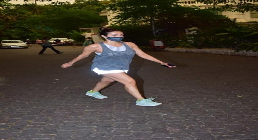 Mumbai, Oct 8 (IANS) Malaika Arora is going through midweek blues, although with a stylish twist, going by her new Instagram post.	 (Photo: IANS)