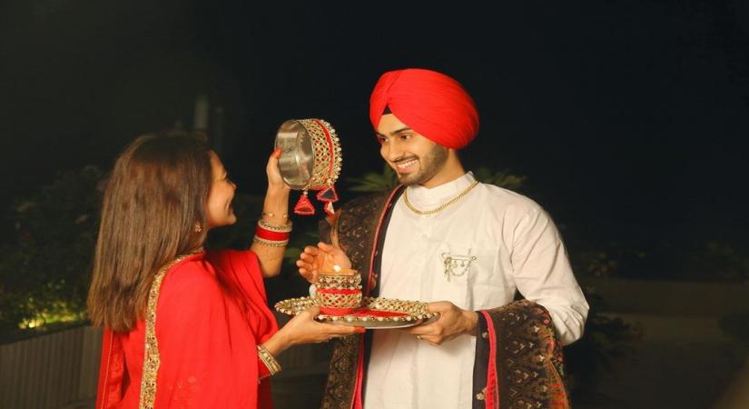Neha Kakkar shares glimpses of first Karwa Chauth with husband Rohanpreet.