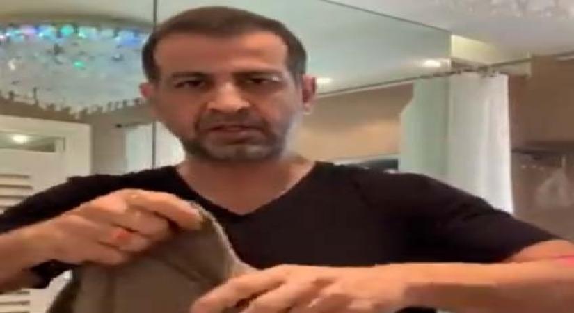 Ronit Roy makes mask out of a T-shirt.